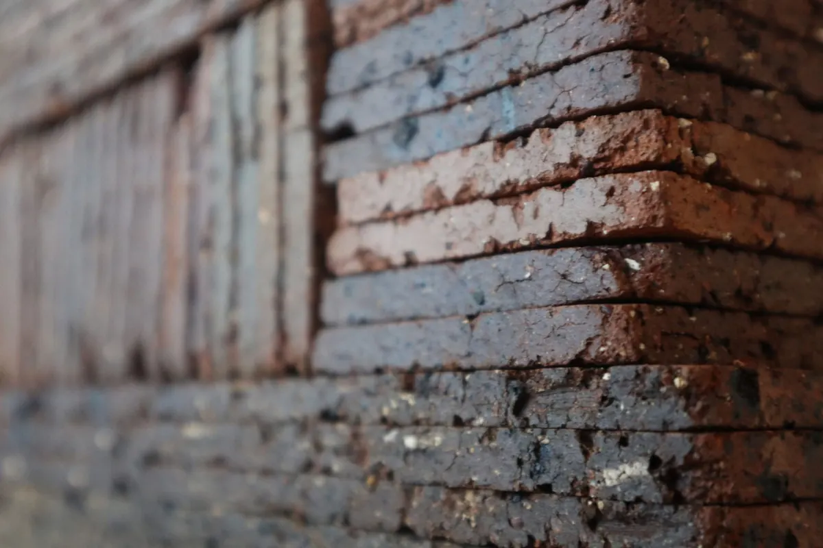 Close-up of stacked clay brick tiles