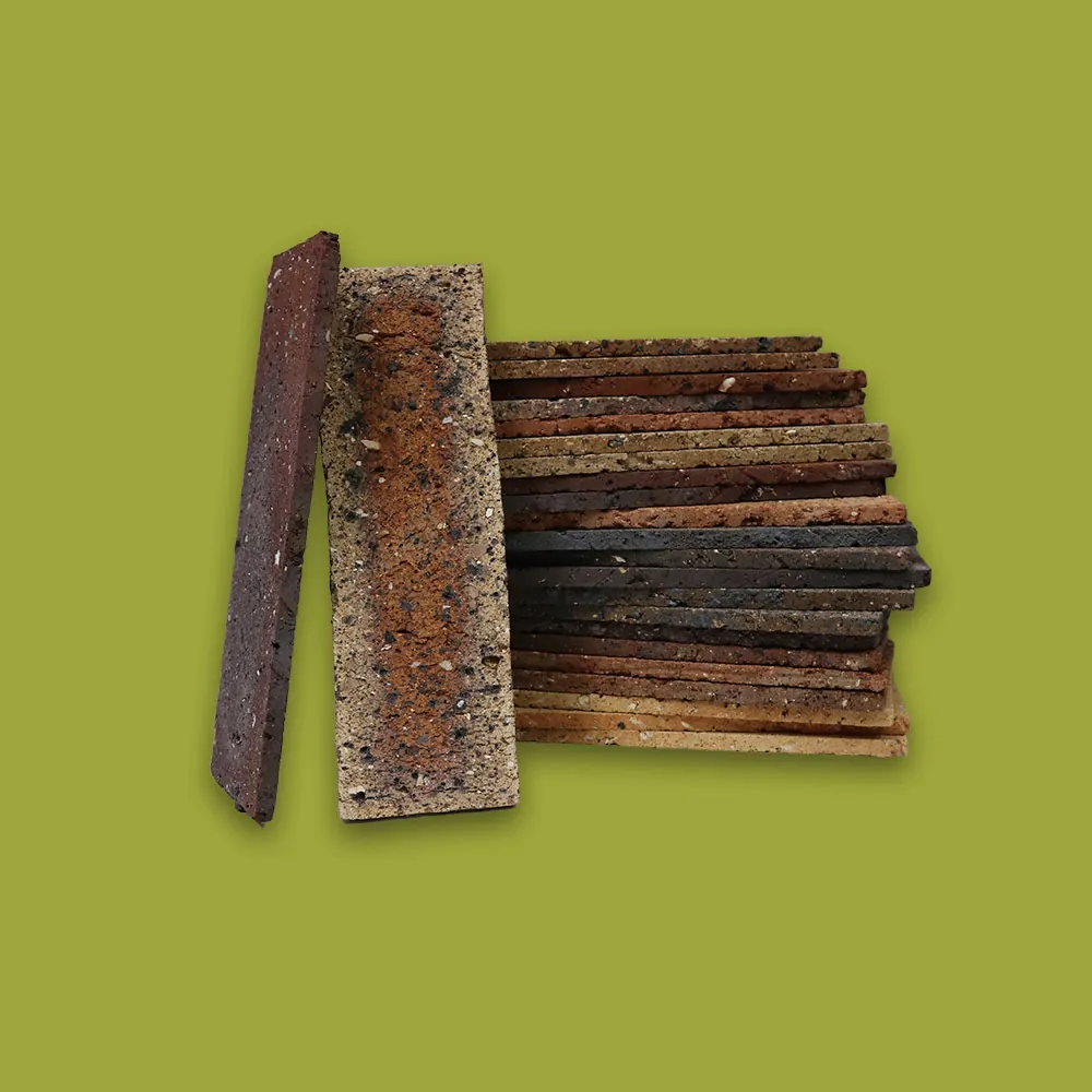A stack of Absolute brick tiles on olive